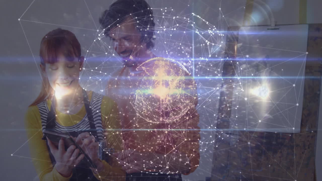 Smiling people using tablet with digital network and globe animation overlay