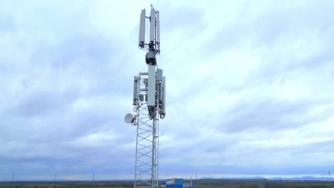 low angle shot of 5g telecommunication tower at base station