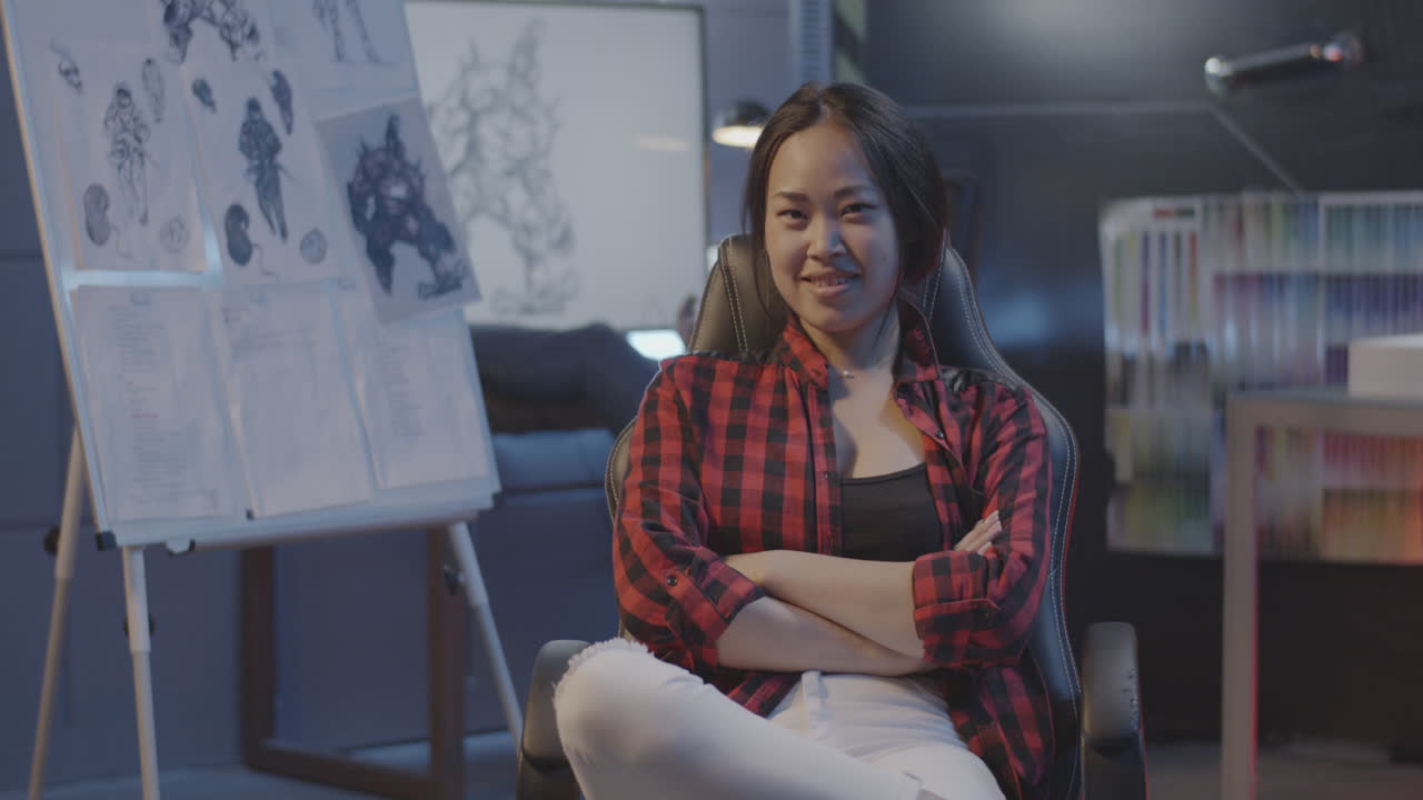 Asian female artist in design studio