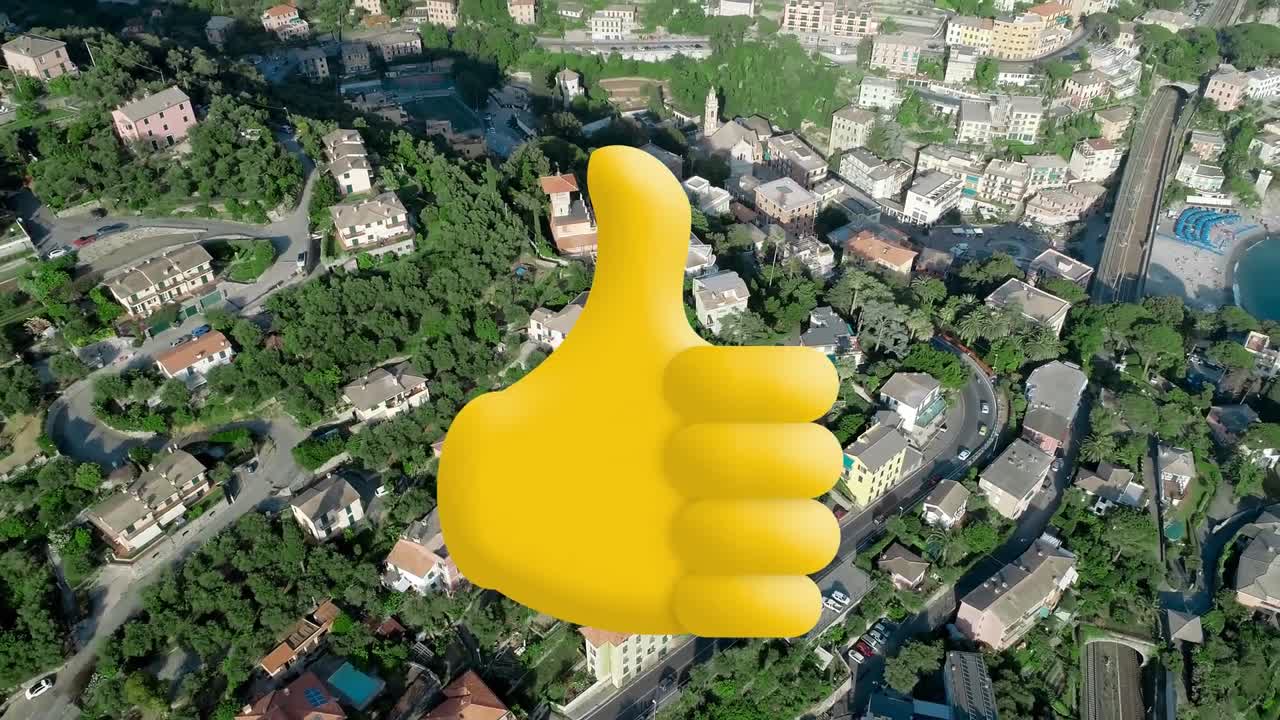 composición digital del icono de pulgares hacia arriba contra la vista aérea del paisaje urbano
