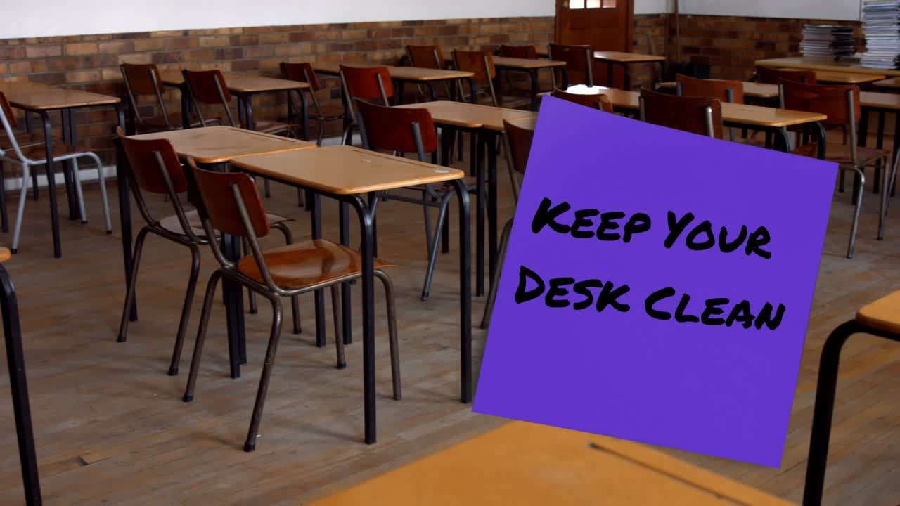 Animation of keep your desk clean text over empty classroom