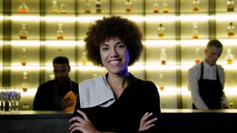 bartender smiling in the pub