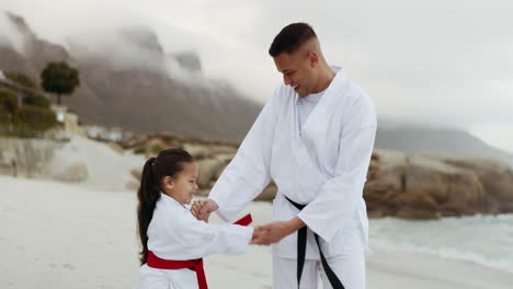 Beach,-karate-teacher-or-child-learning-martial