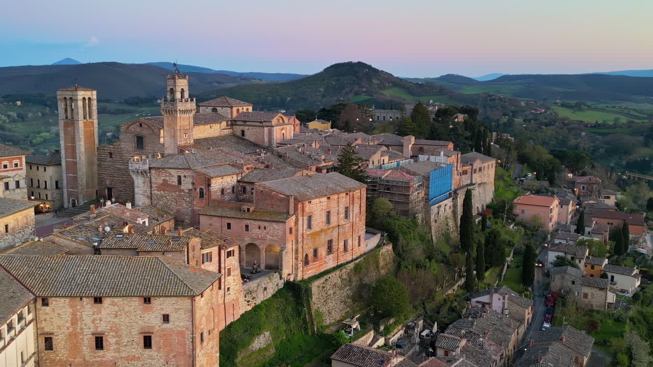 Aerial drone view of the Montepulciano medieval hilltop town in Tuscany, Italy, surrounded by vineyards