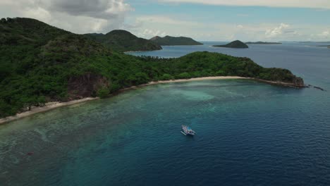 gorgeous aerial view of the philippines scenic coastline with a boat in the water