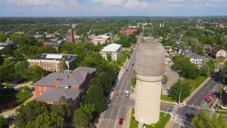 aerial view of a town with a water tower