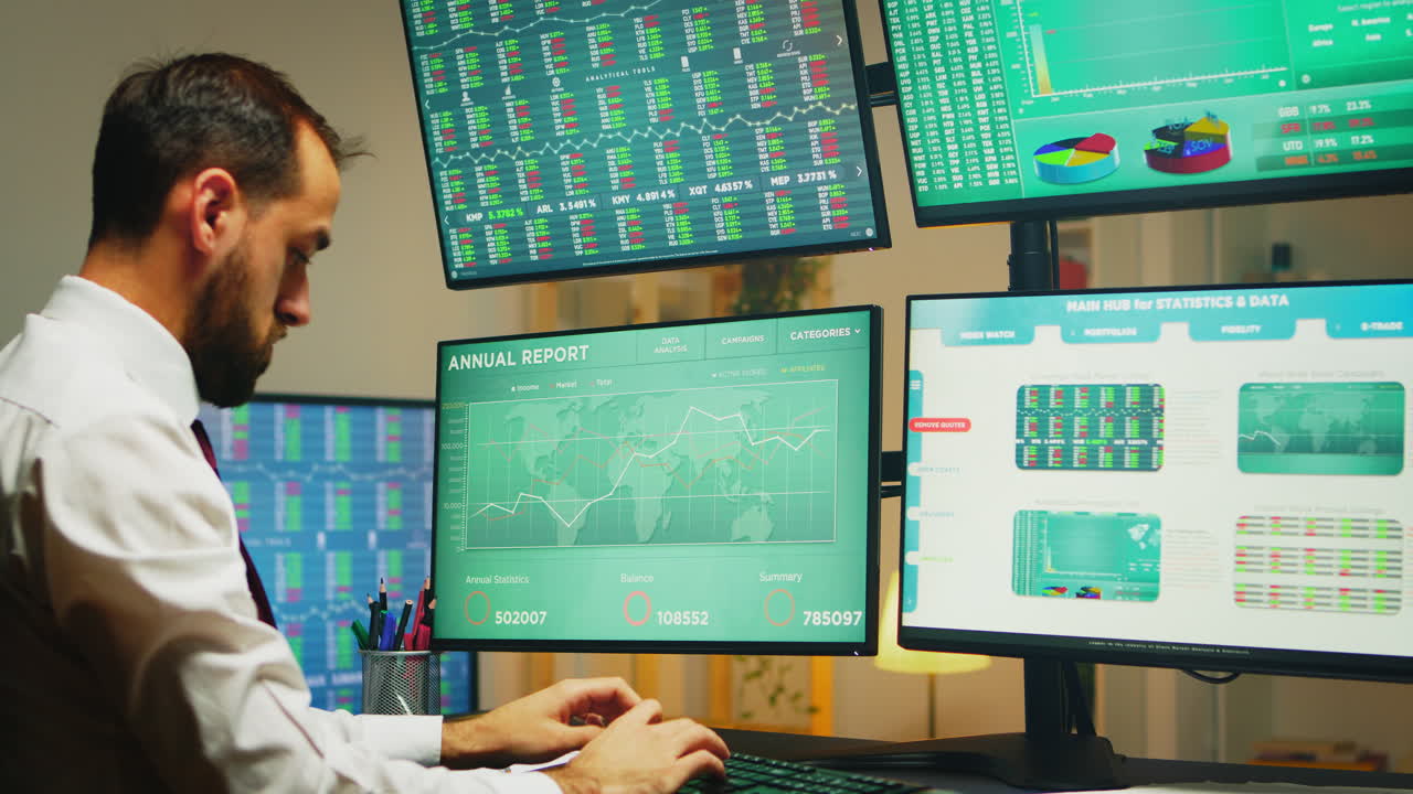 Male stock market broker working from home office