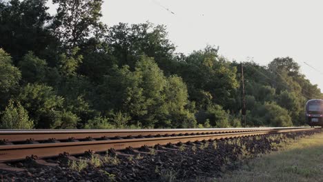 The train passes a German railway line in Günzburg