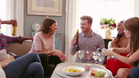 Group-Of-Friends-Celebrating-Together-At-Home-Shot-On-R3D