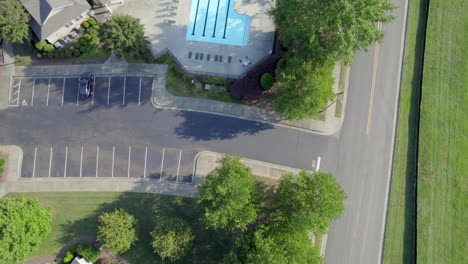 Aerial-over-swimming-pool-in-wealthy-neighborhood