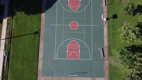 a reveal shot of a sports court at a christian university campus in argentina