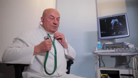 doctor examining patient with stethoscope and ultrasound machine