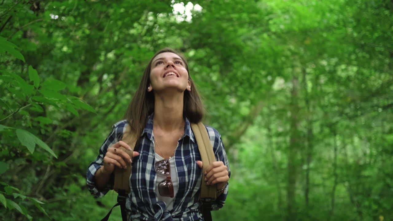 Woman Hiking in a Forest | Premium Stock Video Footage