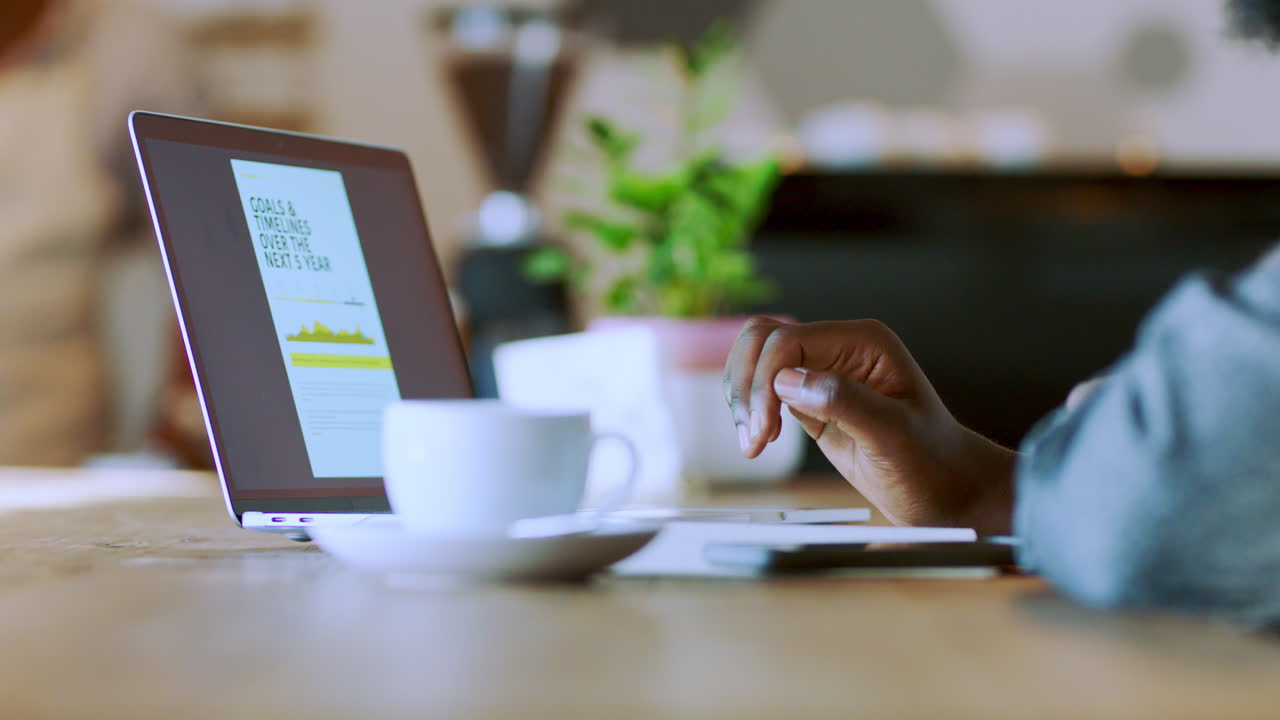 Coffee shop, business and hands working on laptop