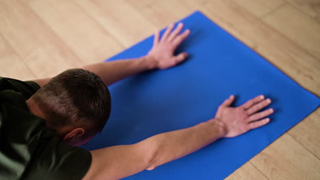 man practising yoga