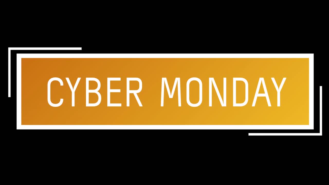 texto blanco y naranja de cyber monday que aparece contra una pantalla negra