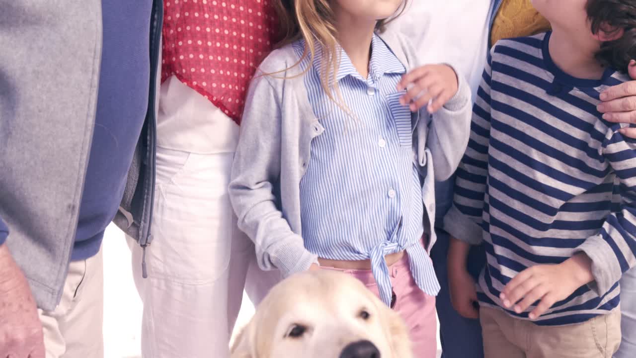 개 를 가진 세 세대 의 가족