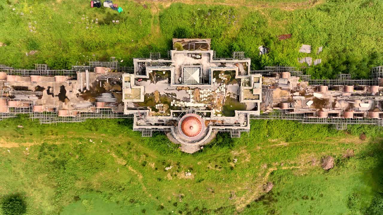 Highcross Manor aka Hamilton Palace. Uckfield, Sussex. 4k birds eye drone footage showing ascent from roof of Palace. Video slowly reveals the size and footprint of building.