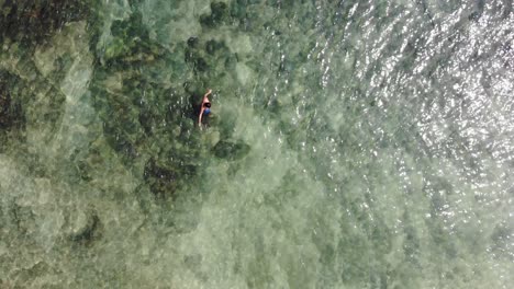 panama in february drone shoots contadora island swimming in between fishes capture with a drone-5