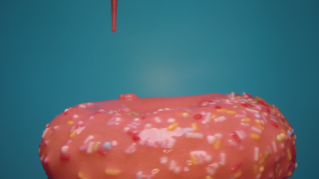 el esmalte se vierte sobre la rosquilla giratoria