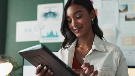 a woman using a tablet in an office setting