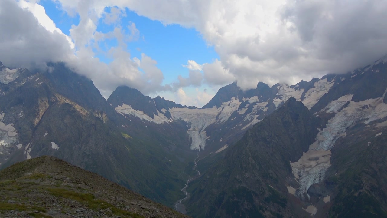 Sunny summer mountains in Dombai national park, Caucasus region of Russia