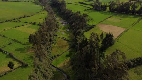 Aerial-shot-following-the-San-Pedro-river-bed,-Machachi,-Ecuador