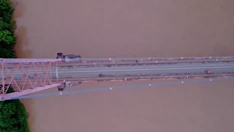 Witness-the-urban-hustle-and-bustle-from-above-as-you-cross-the-Continental-Bridge-of-Puerto-Maldonado