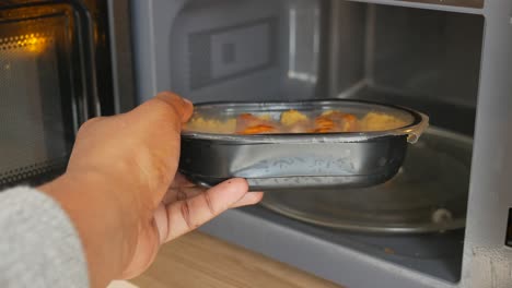 reheating a meal in the microwave