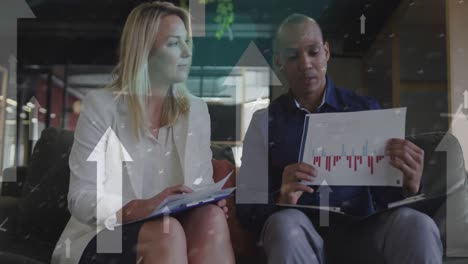 animation of arrows and data processing over diverse business people working in office