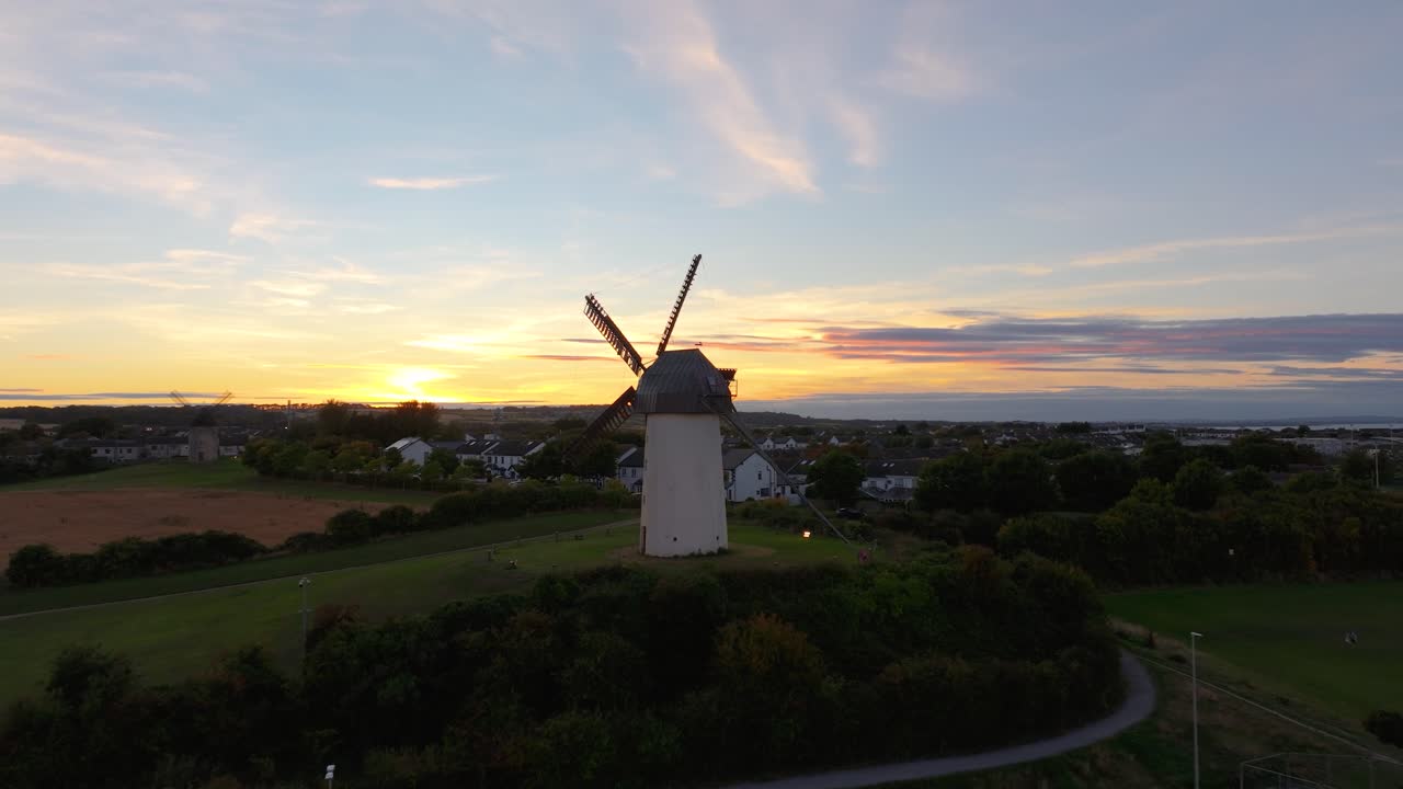 4K High-resolution drone shot of the historic Skerries windmills, at the sunset Co.Dublin, Ireland_07