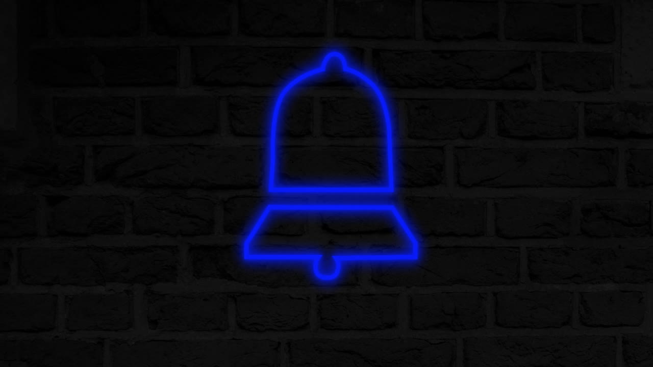 벽돌 벽 4k에 네온 표지판을 내려 놓습니다.