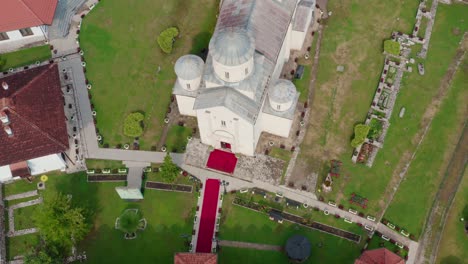 orthodox monastery mileseva in the mountains near prijepolje, serbia - aerial pullback