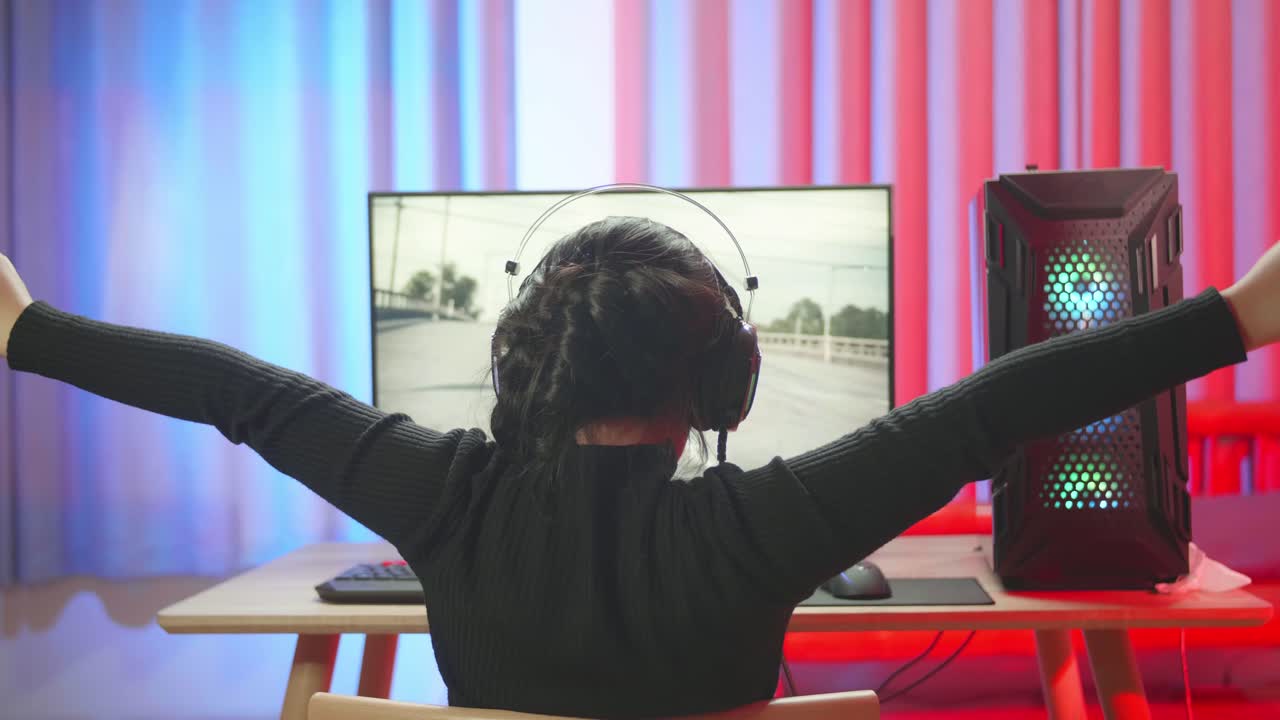 Woman Gamer Celebrating Victory