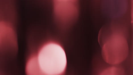 video de puntos de luz bokeh rosados parpadeantes con espacio de copia