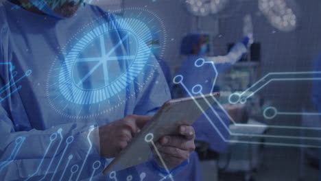 medical professional holding tablet using holographic interface under surgical lights in or