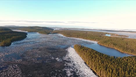 the ice start to melt on a huge lake in north of quebec, canada