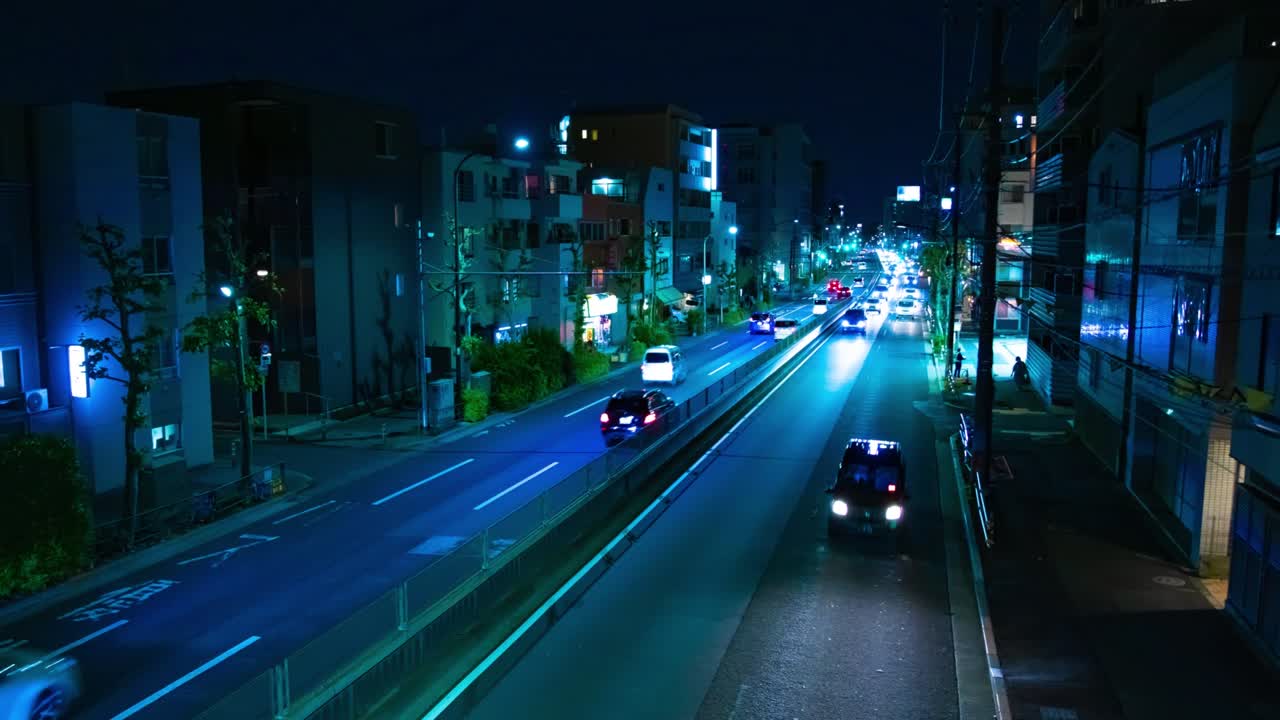 도쿄 시내 거리의 교통체증의 야간 타임스 화면