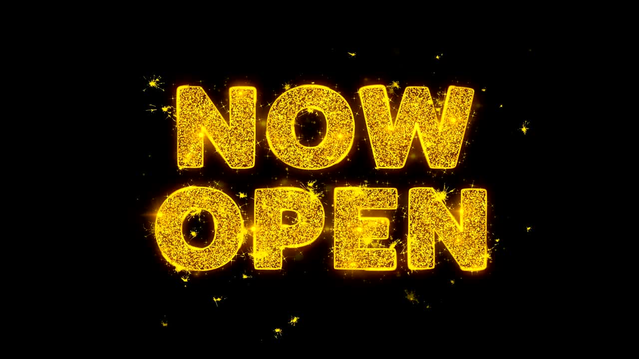 ahora el texto abierto enciende partículas sobre un fondo negro.