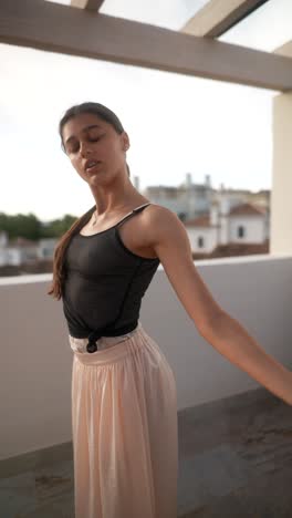 ballet dancer on a balcony