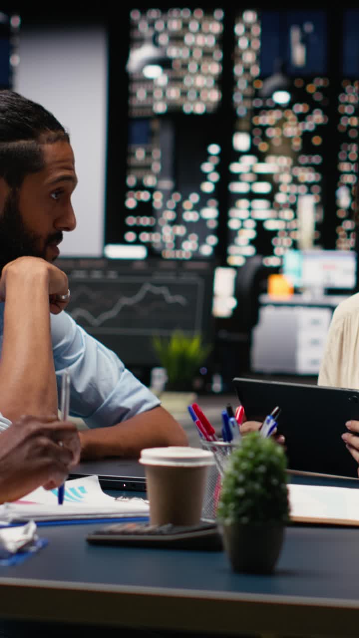Vertical Video Working together with reports, colleagues in office doing business meeting