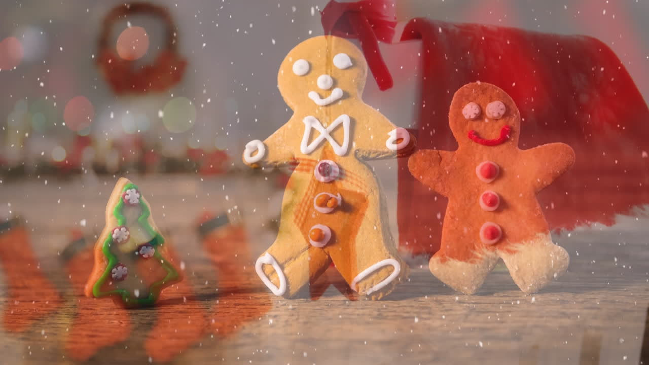 Animation of snow falling over christmas cookies