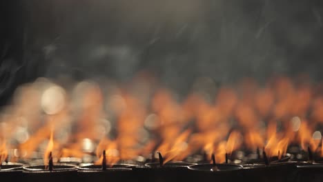 Beautiful-prayer-candles-burn-at-a-Buddhist-temple-1