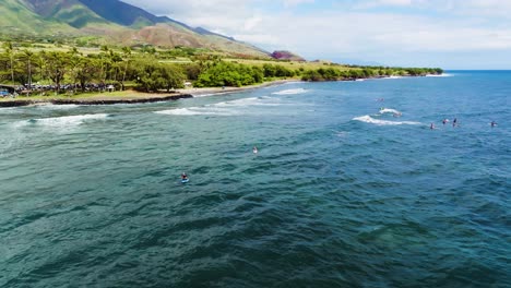 Fantastic-Drone-Footage-Orbiting-Surfers-In-Maui