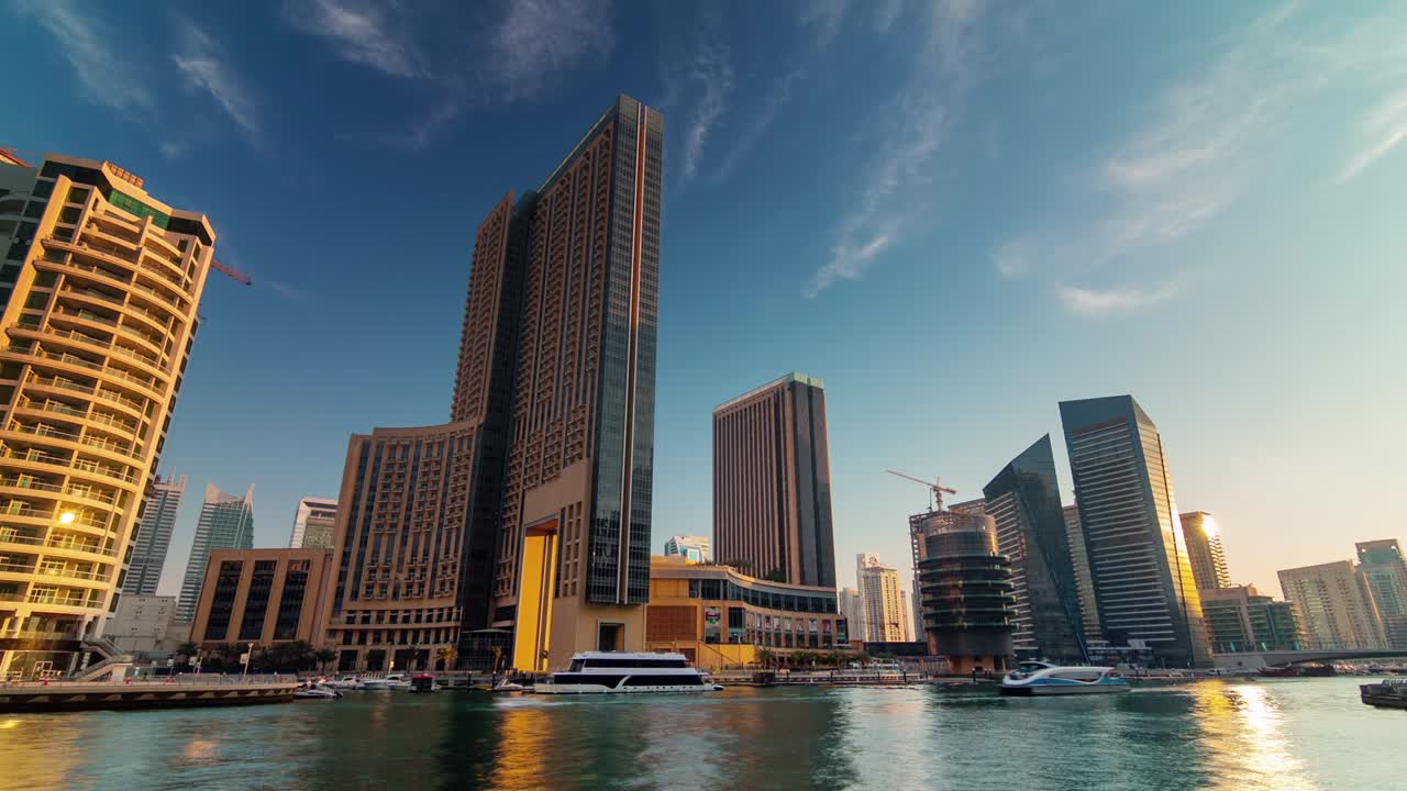 dubai marina water traffic yacht boat sunset panorama 4k time lapse united arab emirates
