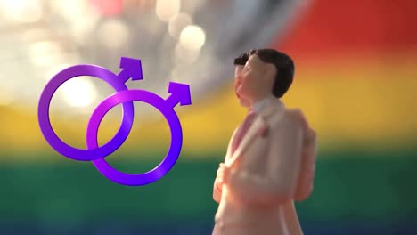 dos símbolos masculinos unidos y figuras masculinas con bola de discoteca