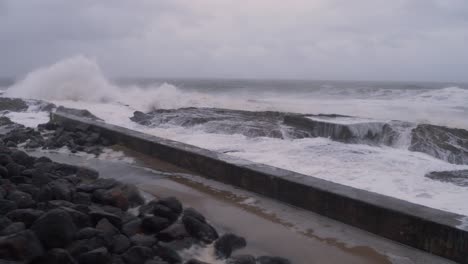 stormy ocean waves at froggy beach in gold coast, queensland, australia - wide shot