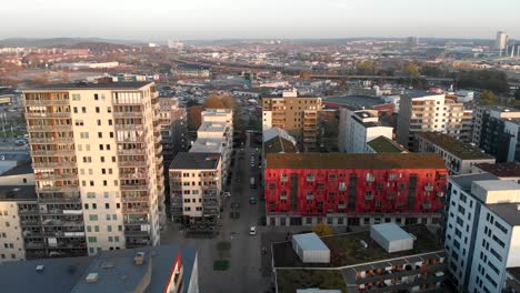 Aerial-pullback-from-colorful-Residential-buildings-from-Hisingen,-Gothenburg