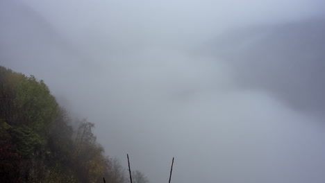 Thick-Fog-Enveloped-The-Mountain-Range-In-Geiranger-From-The-Viewpoint-At-Ornesvingen-In-Norway