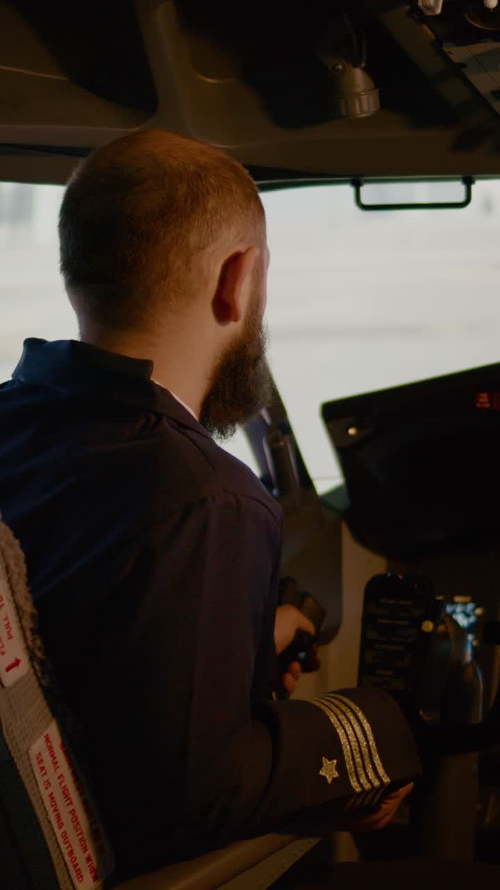 Pilot in Airplane Cockpit